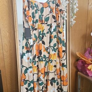Eloquii dress floral size 18  rayon waist is elastic and bottom has layers
